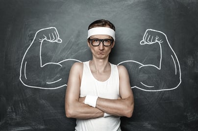 Funny Sports Nerd with Muscles Drawn on Chalkboard