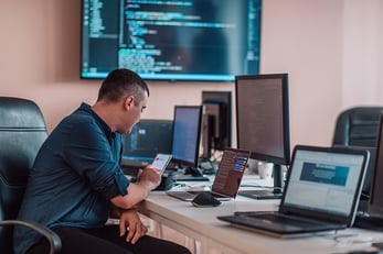 Man_Working_On_Phone