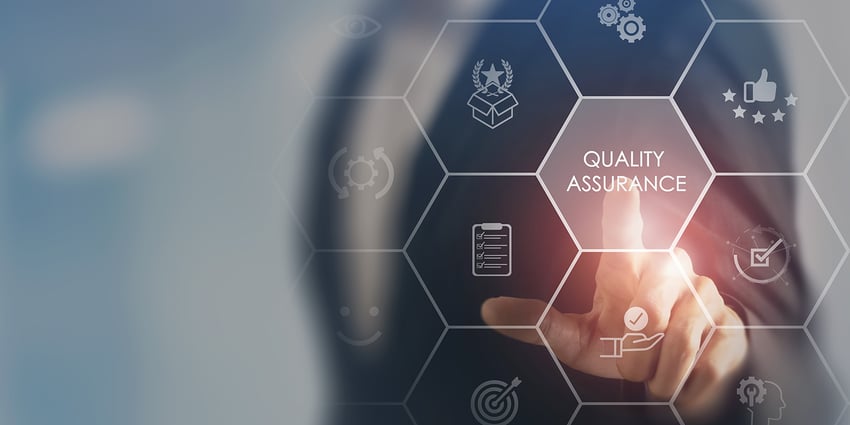Person-pointing-to-Quality-Assurance